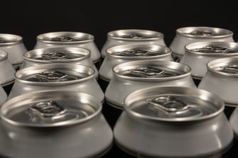 Aluminum beverage cans in a row